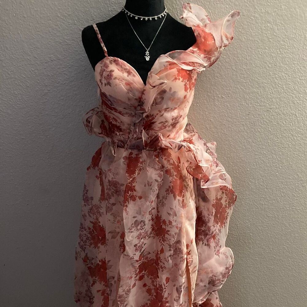 Pink floral ballroom dress with ruffles